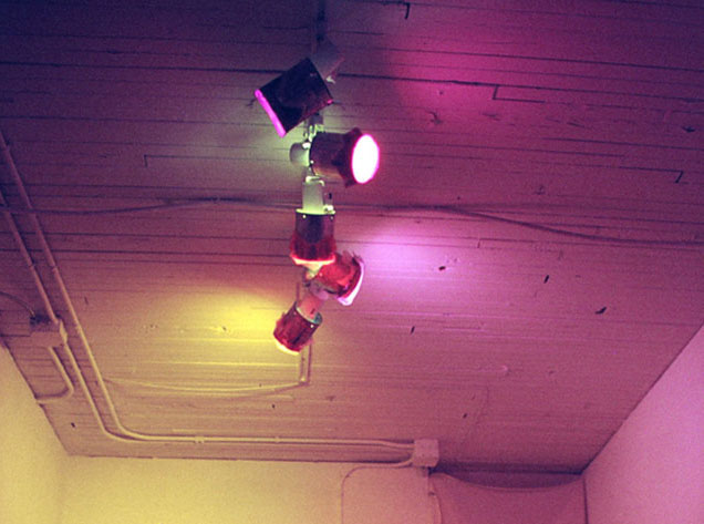 track lights on an old wood ceiling project purple and orange light